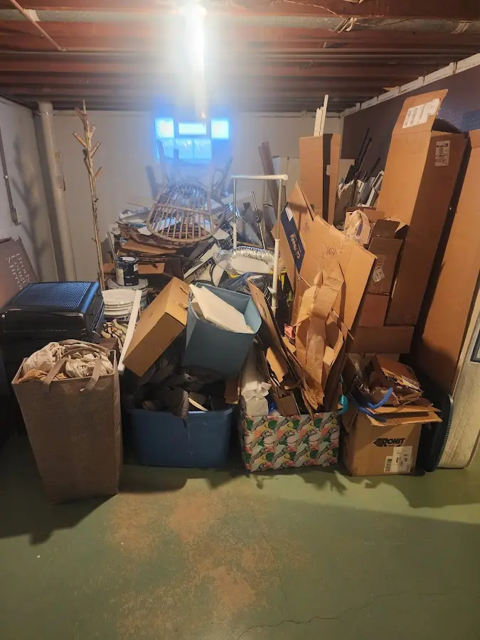 Roll-off dumpster container at job site for 2 Yard Dumpster Rental in Hainesville